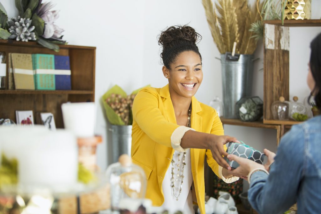 Saleswoman helping customer