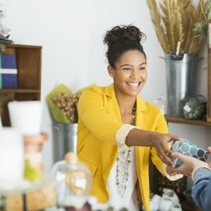 Saleswoman helping customer