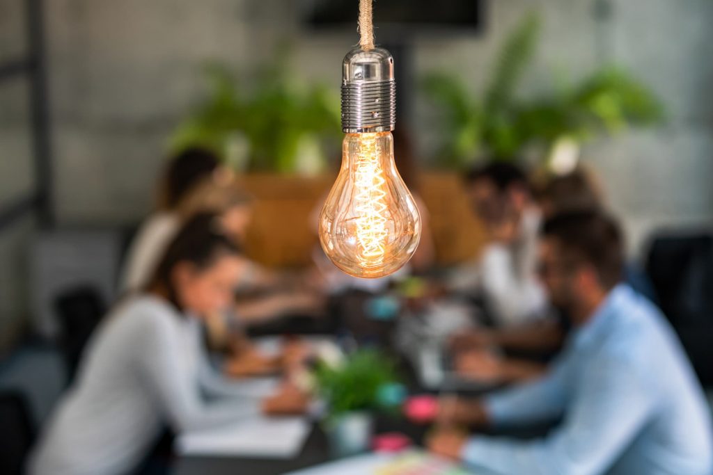 Lightbulb above a business team