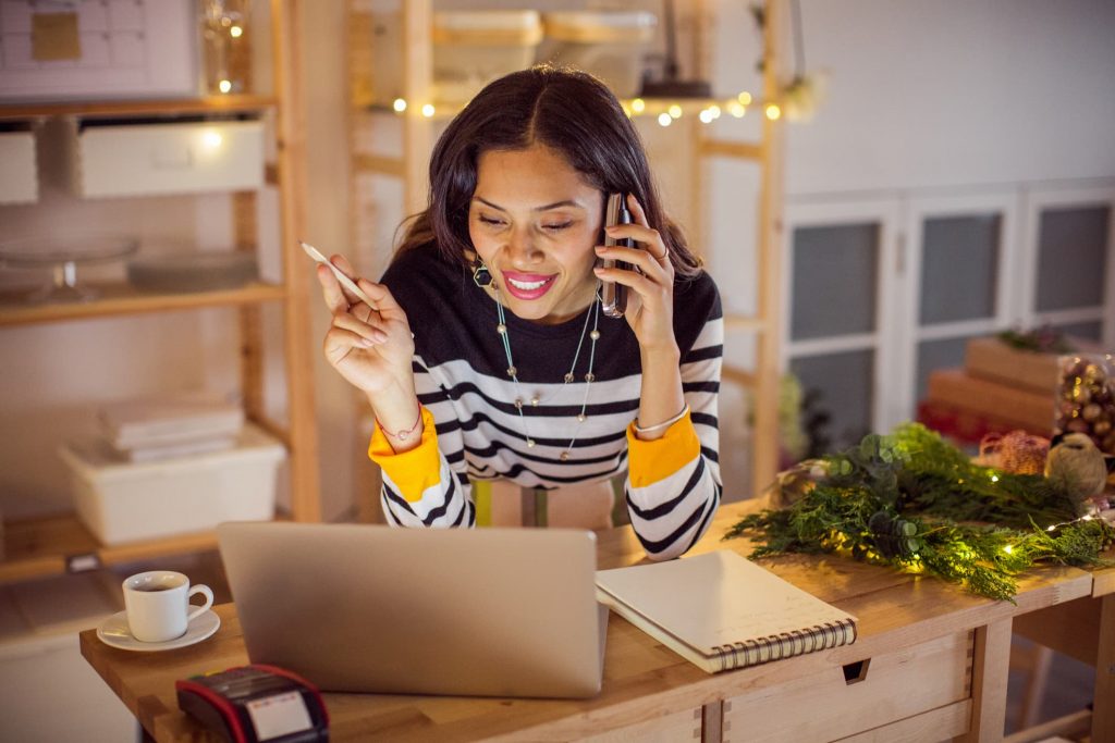 Business owner filling out her holiday checklist