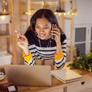 Business owner filling out her holiday checklist