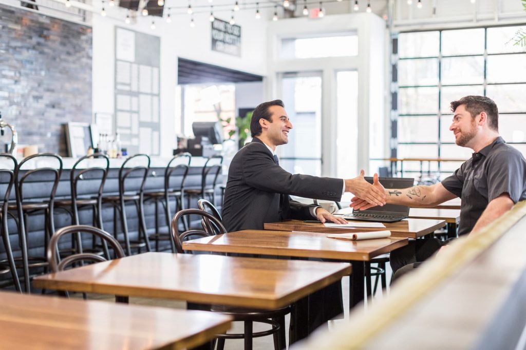 Two Business People Shaking Hands